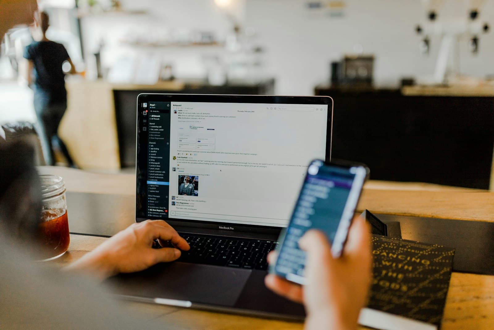 Person reviewing secure account activity on a laptop
